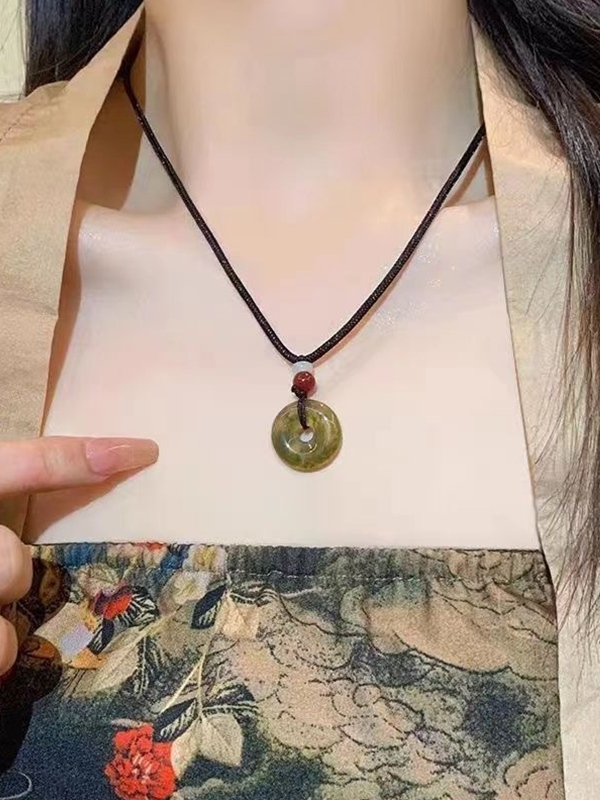 Hollow Out Jade Pendant Braided Rope Necklace